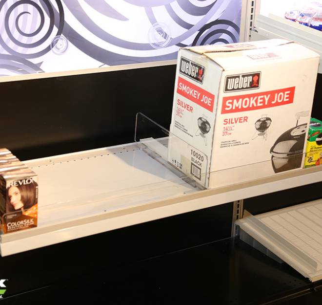@Front retail shelving with boxed merchandise